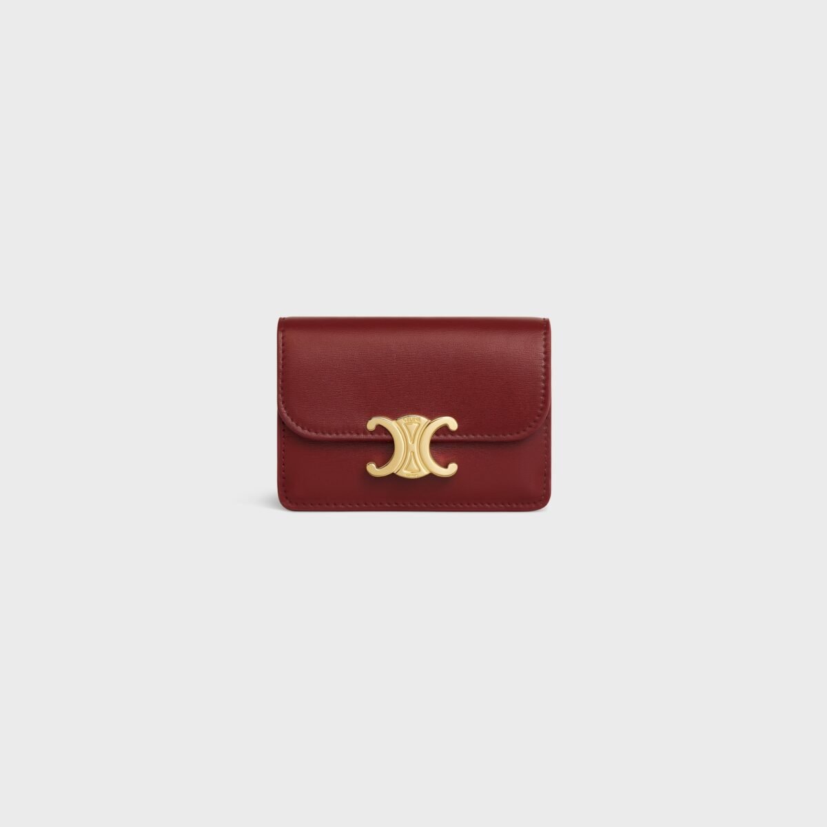 CARD HOLDER WITH FLAP TRIOMPHE IN SHINY CALFSKIN DARK RUBY